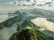 Aerial panorama of Rio de Janeiro, mountains and ocean surrounding the city, high angle view of Sugar Loaf Mountain