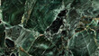 Emerald green marble texture with deep green and black veins, capturing the richness of precious gemstones
