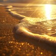 Close-up of gentle waves under a golden sunset, with the ocean's surface sparkling as if strewn with diamonds.