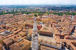 Modena, Italy. Historical bell tower. Torre Civica - Ghirlandina. Panorama of the city on a summer day. Sunny weather