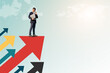 Professional businessman standing on red arrow symbolizing growth and success. Financial growth concept