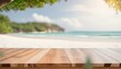 Vintage Beach Vibes: Wood Tabletop Against Blurred Coastal Backdrop