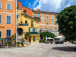 Old colorful buildings on the small town square in Menton, France.