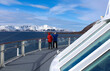 Tourist couple on cruise boat deck in Norway
