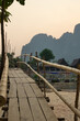 Heavenly balance: the bamboo footbridge and Vang Vieng