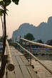 Heavenly balance: the bamboo footbridge and Vang Vieng