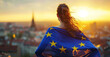 woman wrapped in the flag of the European Union