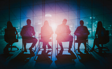 Wall Mural - double exposure image of many business people conference group meeting on city office building in ba