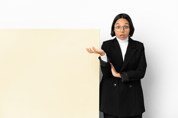 Wall Mural - Young business mixed race woman with with a big banner over isolated background making doubts gesture
