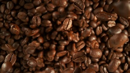 Poster - Super Slow Motion of Falling Coffee Beans, Rotating. Filmed on High Speed Cinema Camera, 1000fps.