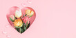 Floral pink background, composition. Bouquet of fresh beautiful tulips in  frame made in the shape of heart on pastel pink background. Mother's Day, Valentine's Day, wedding. Banner