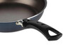 Close-up of the plastic black handle of the frying pan.