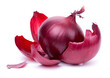 A vibrant red onion with its layers partially peeled, showcasing freshness and quality, isolated on a white background