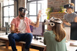 © Wavebreak Media - Diverse team in VR headsets explores digital space in a modern office