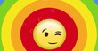 Image of wink emoji with speech bubble moving over rainbow color background