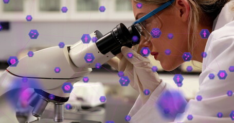 Poster - Image of network of connection with interface medical icons over female scientist using microscope