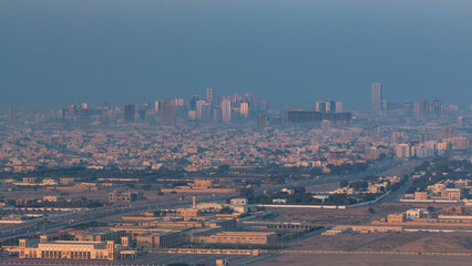 Wall Mural - Cityscape of Ajman from rooftop early morning timelapse. United Arab Emirates.