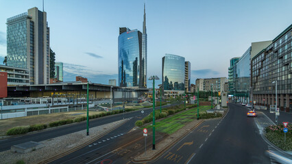 Wall Mural - Milan skyline with modern skyscrapers in Porta Nuova business district day to night timelapse in Milan, Italy, after sunset.