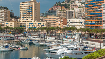 Wall Mural - Monte Carlo city aerial panorama timelapse. View of luxury yachts and apartments in harbor of Monaco, Cote d'Azur.