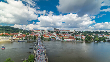 Wall Mural - Charles Bridge and Prague Castle timelapse, view from the Bridge tower, Czech Republic