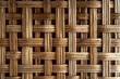 The woven texture of rattan, a natural material often used in furniture and decor. 