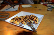 Sweet waffle vanilla topping chocolate sauce recipe on ceramic dish plate serve customer guest people in cafe coffee shop and restaurant of hotel hostel at Chiangrai city in Chiang Rai, Thailand