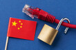 An open padlock on a computer network wire and a Chinese flag on a colored background, a concept on the topic of Internet technology security in China