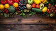 Healthy food background studio photography of different fruits and vegetables on wooden table.