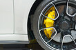 Alloy wheel with calipers and racing brakes of the sport car.