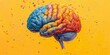Human brain painted in different colors on yellow background, concept of neurodiversity and mental problems
