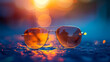 sunset reflection in stylish sunglasses on a wet surface with beautiful bokeh lights