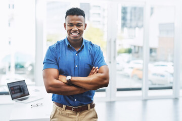 Fototapete - Smile, portrait and African businessman with arms crossed in office for confidence, positive attitude and friendly welcome. About us, face and happy manager with work ethic, career and startup pride