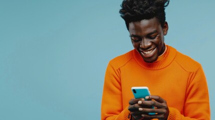 Wall Mural - Man Smiling at Smartphone Screen