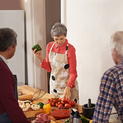 Wall Mural - Cooking course, learning or mature chef with senior people in kitchen for help, guide or how to questions, advice or home. Food, class and nutritionist with audience for teaching, diet or nutrition