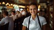 b'Portrait of a smiling waitress in a restaurant'