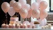 b'A table full of pink and white polka dot balloons, cupcakes, candles, and a cake'