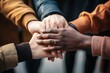 © Adobe Contributor - b'A group of diverse people joining their hands together'
