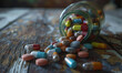 spilled assortment of colorful pills and capsules on rustic wooden surface