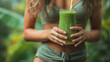 Healthy Smoothie. Fit Girl In Oversize Pants Holding Detox Smoothie.