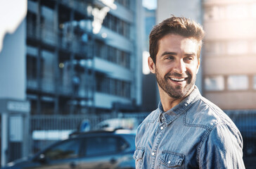 Wall Mural - Man, city and happiness in street for travel, wellness and explore in Los Angeles for summer. American male person, sunshine and smile in the morning for thinking and sightseeing in urban town