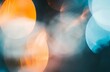 Abstract blurred photograph of blurred orange and blue shapes 