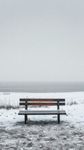 B'Lonely Bench On The Beach In Winter'