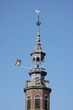 Rainbow flag on a church bell tower in Amsterdam, Holland