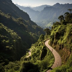 Canvas Print - b'The road winds through the lush green mountains'