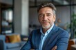 © Spectrum Sculptor - mature 50 year old confident professional manager, confident businessman investor looking at camera, smiling mid aged older business man executive standing in office, Generative AI