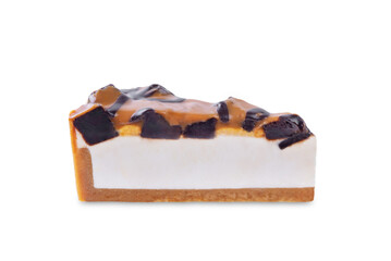 Wall Mural - Caramel brownie cheesecake on a white isolated background