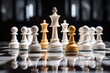 © Thanaphon - White and yellow chess pieces on a reflective chessboard with a dark background.