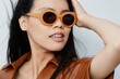 Woman asian lifestyle hair portrait beauty model glamour fashion vacations sunglasses beige