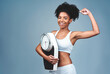 Black girl, portrait and bicep for scale in studio, weight loss and confident measure on blue background. Female person, fitness and diet for balance, mockup space and strong proud for empowerment