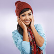 Portrait, happy and woman in winter fashion isolated on purple studio background. Face, smile and young model in warm scarf, clothes and student with stylish beanie for cold weather in Argentina